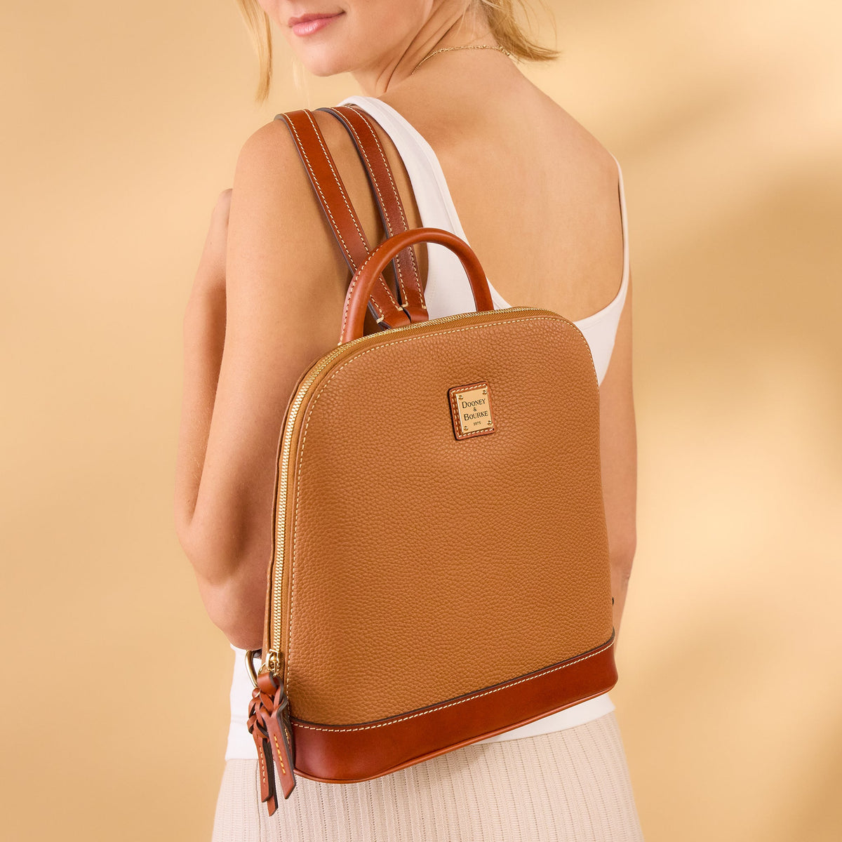 dooney and bourke pebble leather backpack & Women's Grain Zip Pod in Spearmint made from rich pebble leather Dooney & Bourke Pebble Leather
