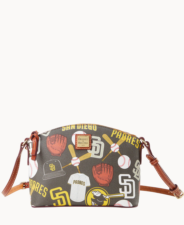 A small brown crossbody bag with leather straps, featuring colorful San Diego Padres logos, baseball gloves, bats, caps, and baseballs printed across the fabric.