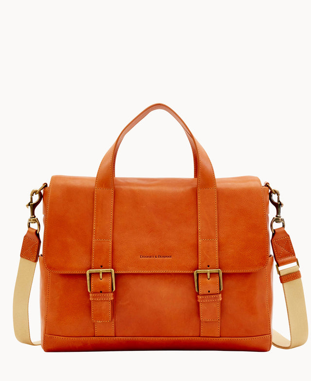 A tan leather satchel with two top handles, a detachable shoulder strap, and two front buckle closures. The bag has a structured shape and a smooth finish.