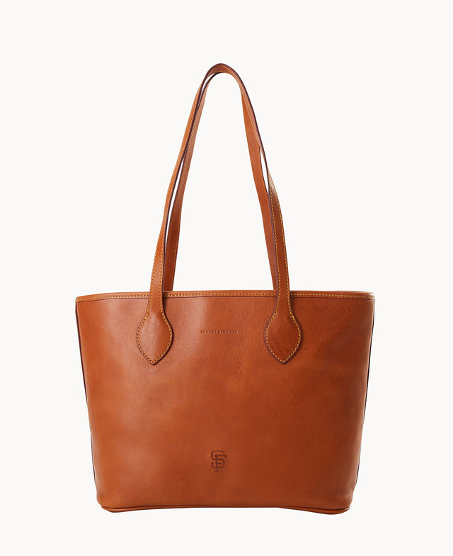A tan leather tote bag with two shoulder straps, subtle stitching along the edges, and a small embossed logo near the bottom center. The surface is smooth and the design is simple and elegant.