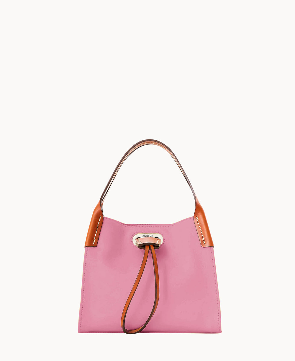 A small pink handbag with light brown leather handles and a brown drawstring closure, set against a plain white background.