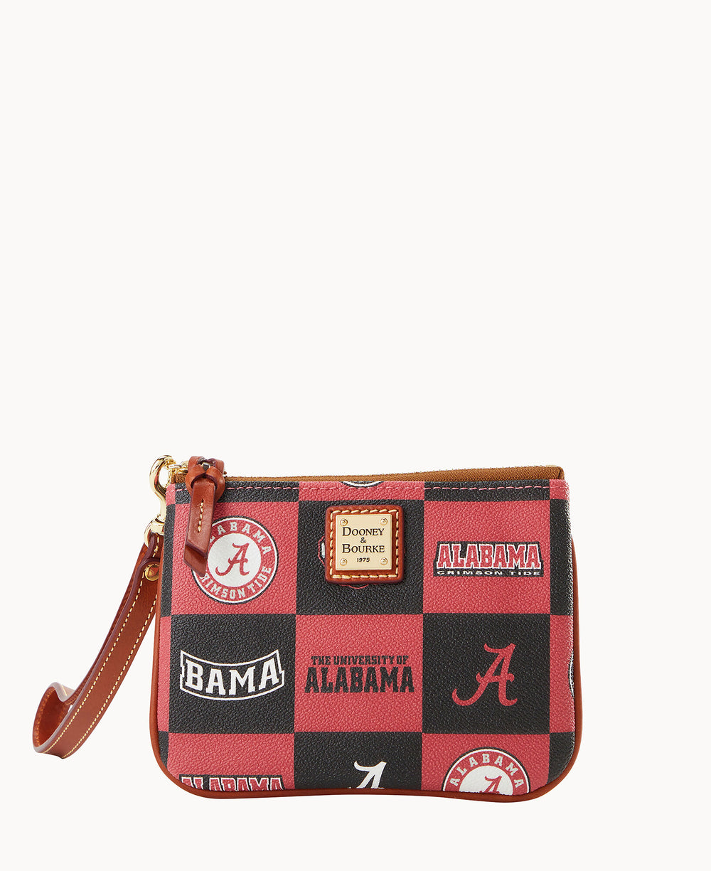 A small wristlet purse with a red and black checkered pattern featuring the University of Alabama logos and text. The purse has a brown leather strap and gold-tone hardware.