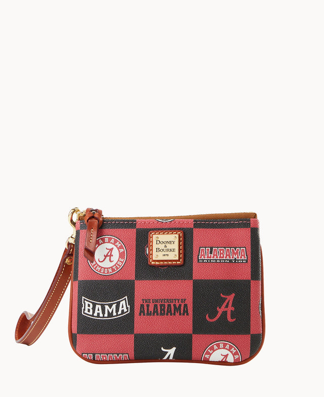 A small wristlet purse with a red and black checkered pattern featuring the University of Alabama logos and text. The purse has a brown leather strap and gold-tone hardware.