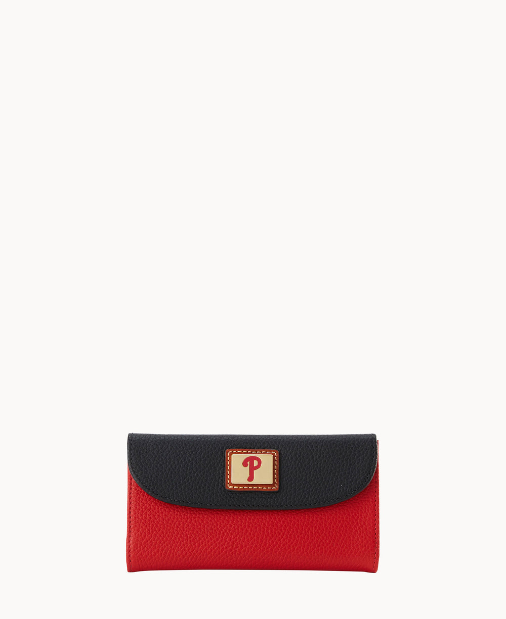 A rectangular wallet with a textured red body and a black flap, featuring a gold label with a red letter P on the front center.