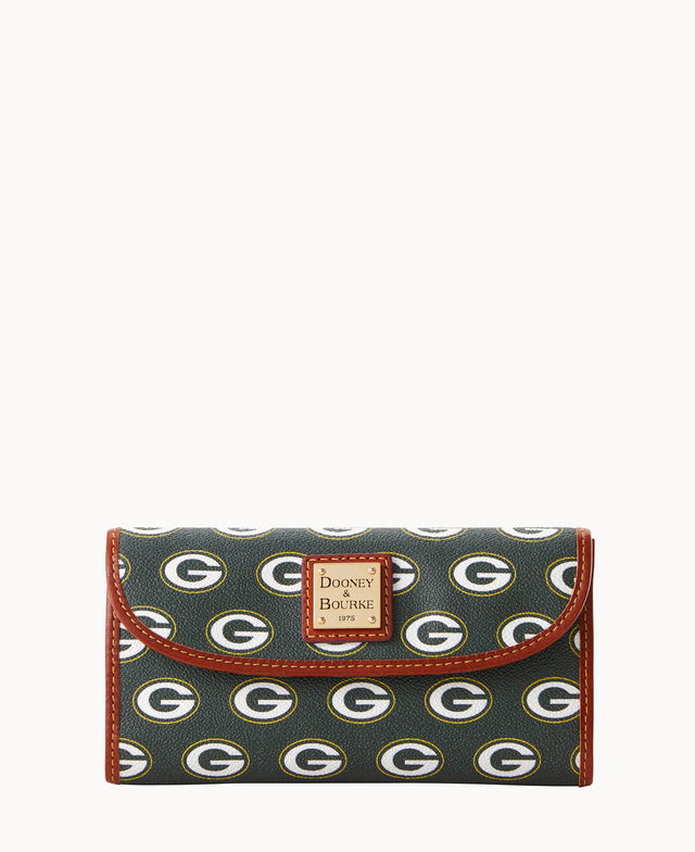 A Dooney & Bourke wallet featuring a pattern of Green Bay Packers G logos on a dark background, with brown trim and a logo patch on the flap.