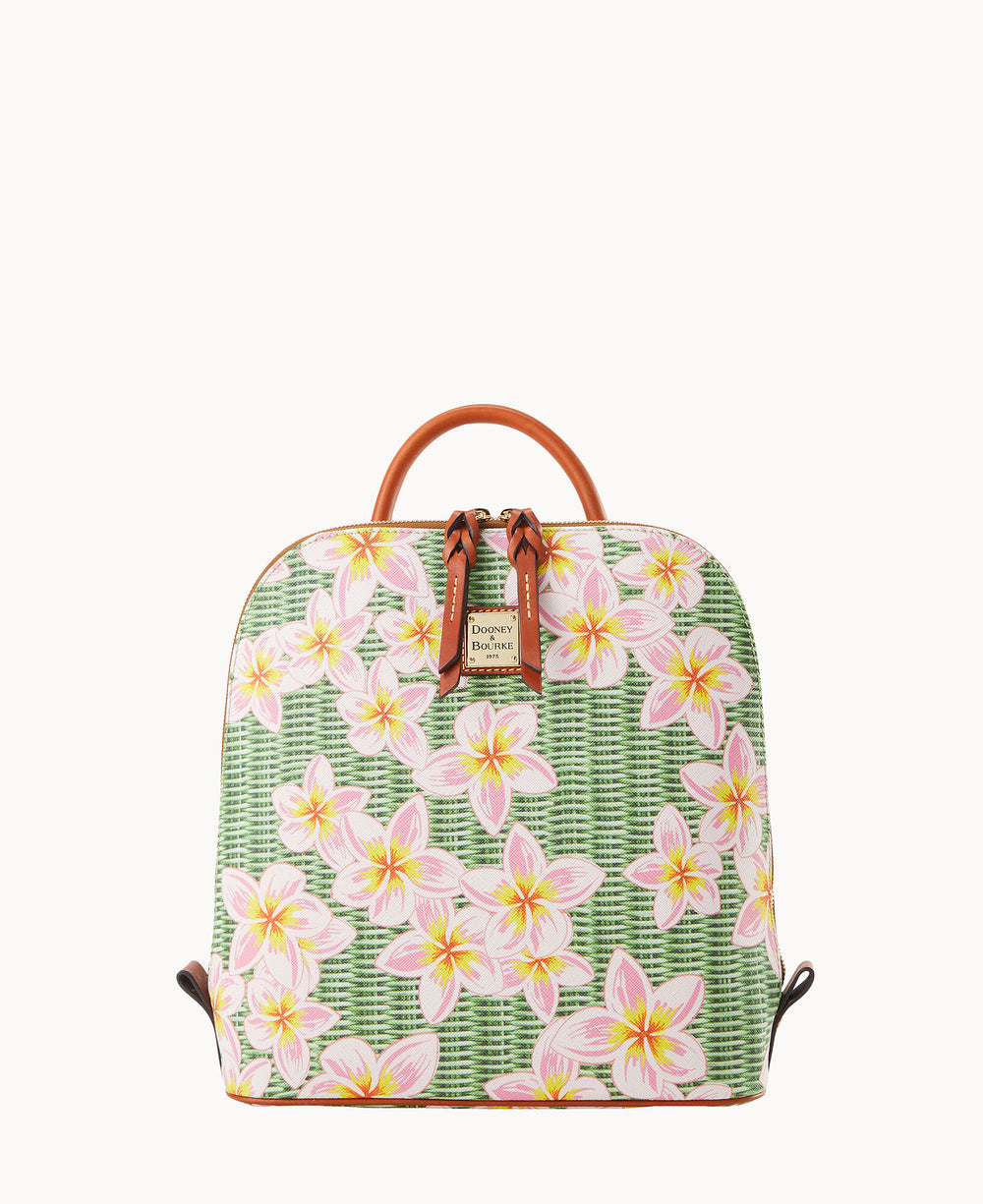 A dome-shaped backpack with brown leather handles and trim, featuring a green woven pattern and decorated with pink and yellow plumeria flowers.