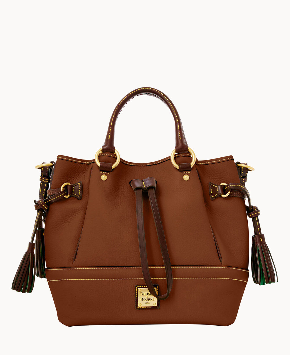A brown leather handbag with gold hardware, two top handles, side tassels, and a drawstring closure. The bag features a small rectangular Dooney & Bourke logo on the front.