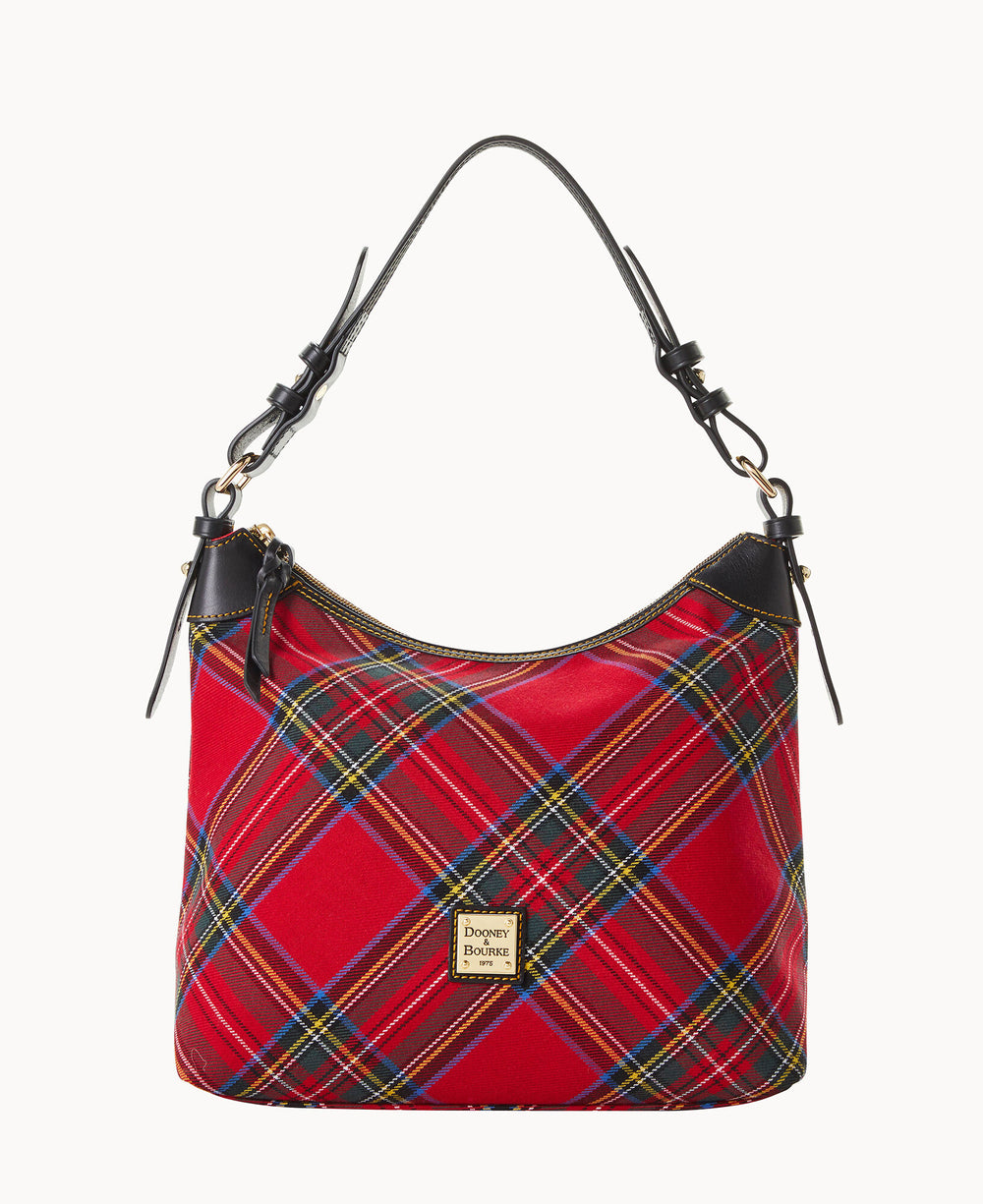A red plaid Dooney & Bourke handbag with a black leather strap, gold-tone hardware, and a front logo patch.