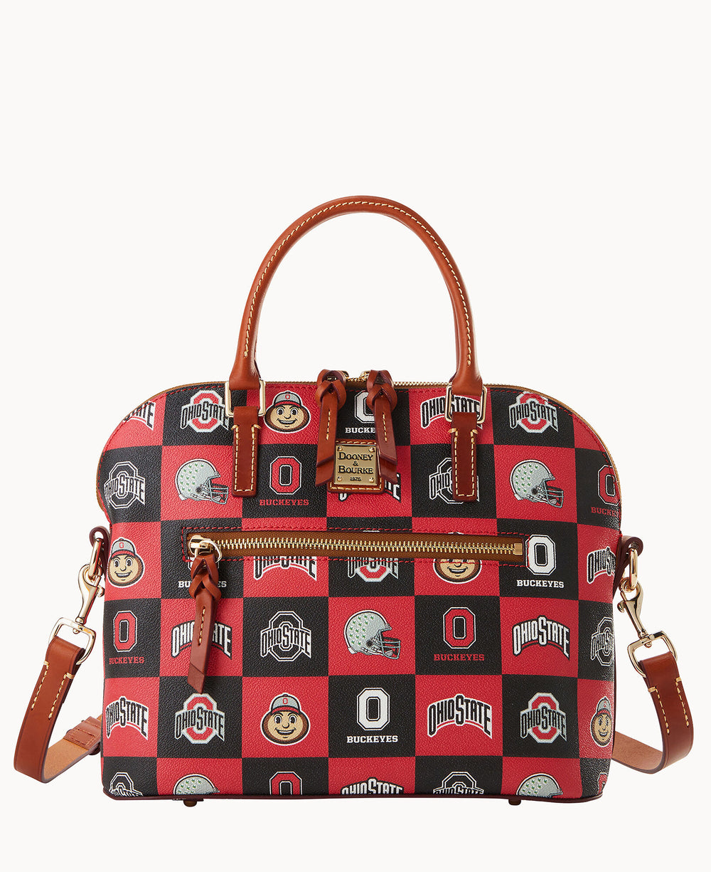 A Dooney & Bourke handbag with brown leather handles and a crossbody strap, featuring a red and black Ohio State Buckeyes patchwork design with logos, mascot images, and decorative icons.