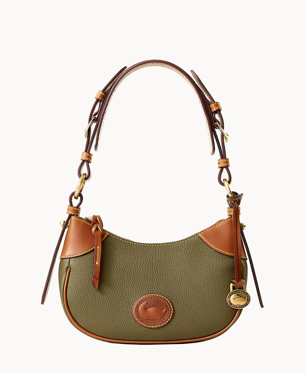 An olive green and brown leather shoulder bag with gold hardware, a rounded shape, top handle with buckle details, and a circular logo patch on the front.