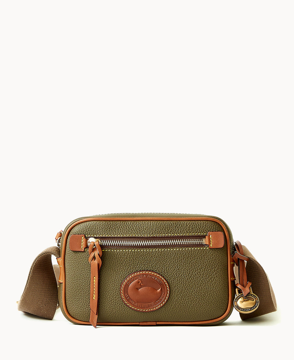 Olive green leather crossbody camera bag by Dooney & Bourke with brown leather accents and gold hardware