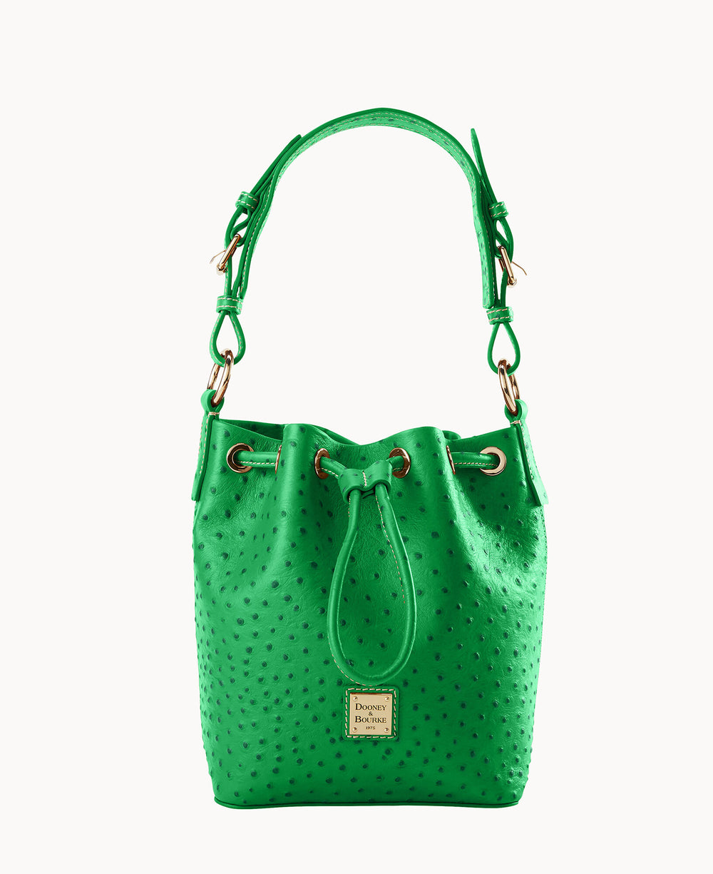 Green ostrich leather bucket bag by Dooney & Bourke with drawstring top and adjustable shoulder strap