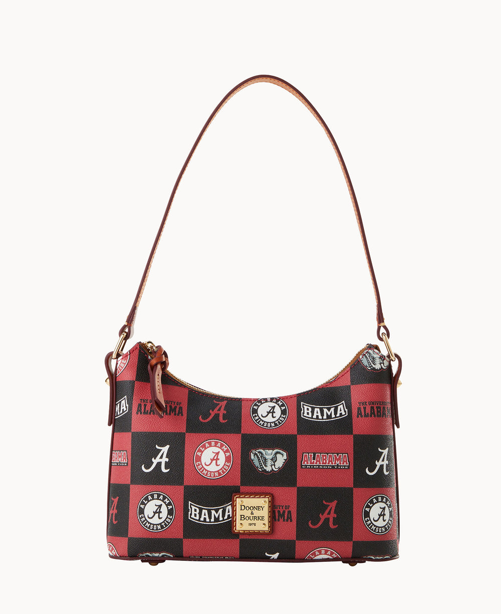 A red and black shoulder bag with brown straps, decorated with various University of Alabama logos and emblems, including â€œAâ€, â€œBAMAâ€, and an elephant, by Dooney & Bourke.