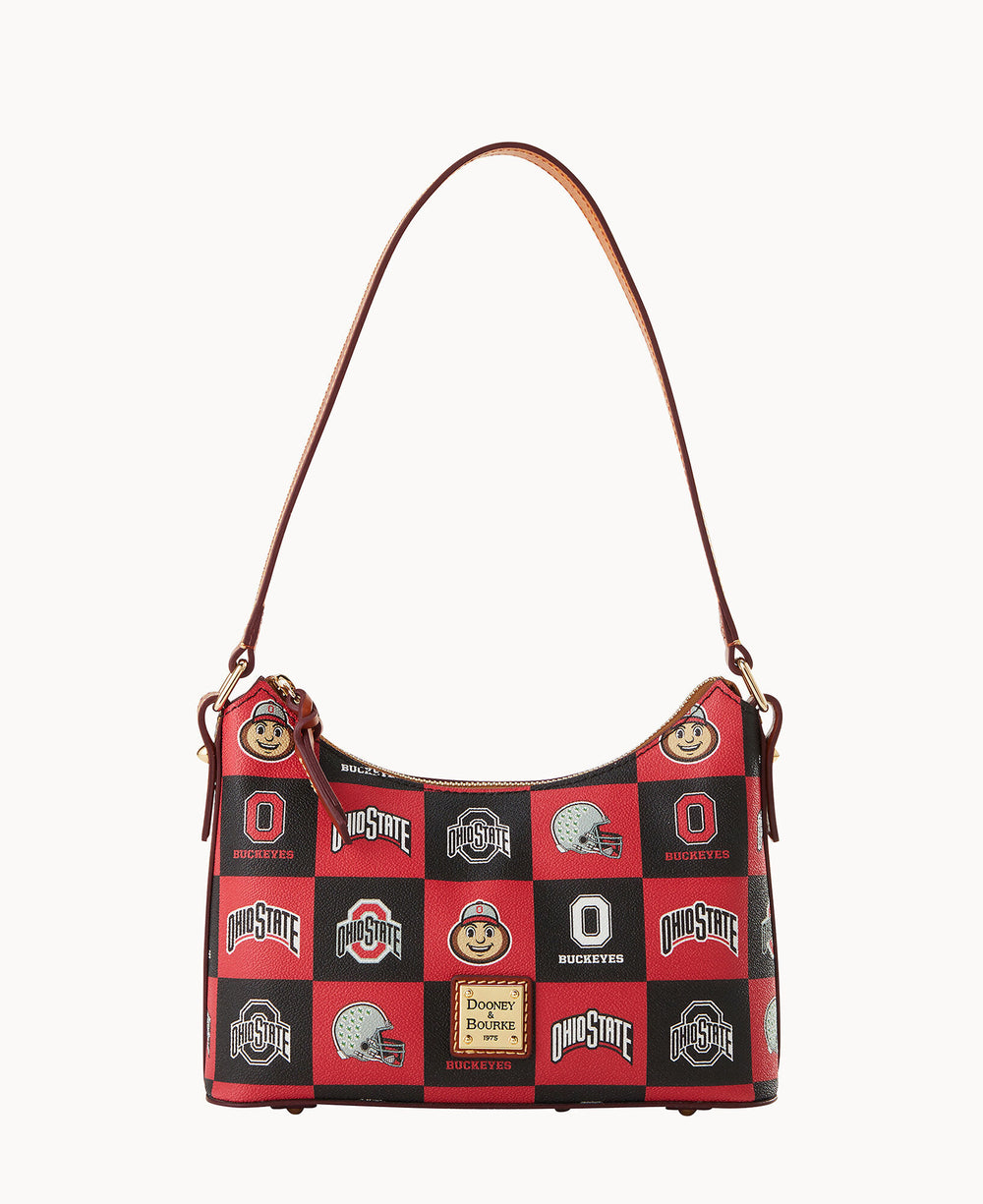 A handbag with a brown shoulder strap featuring a red and black checkered pattern with Ohio State Buckeyes logos, Brutus Buckeye mascots, helmets, and Dooney & Bourke branding on the front.