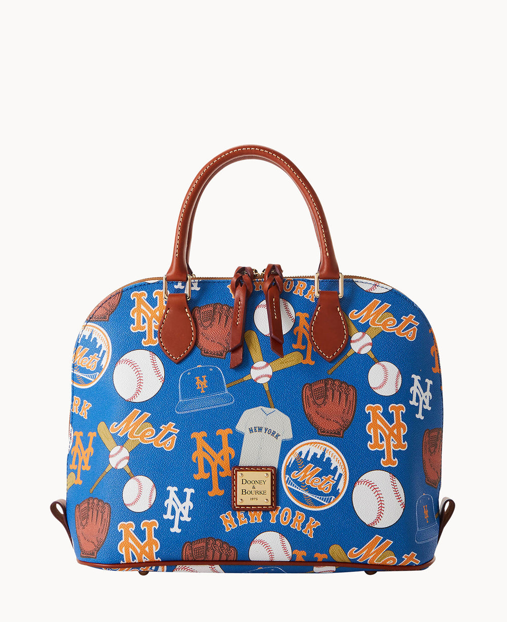 A blue Dooney & Bourke handbag with brown handles, decorated with New York Mets logos, baseballs, gloves, bats, and other baseball-themed graphics.