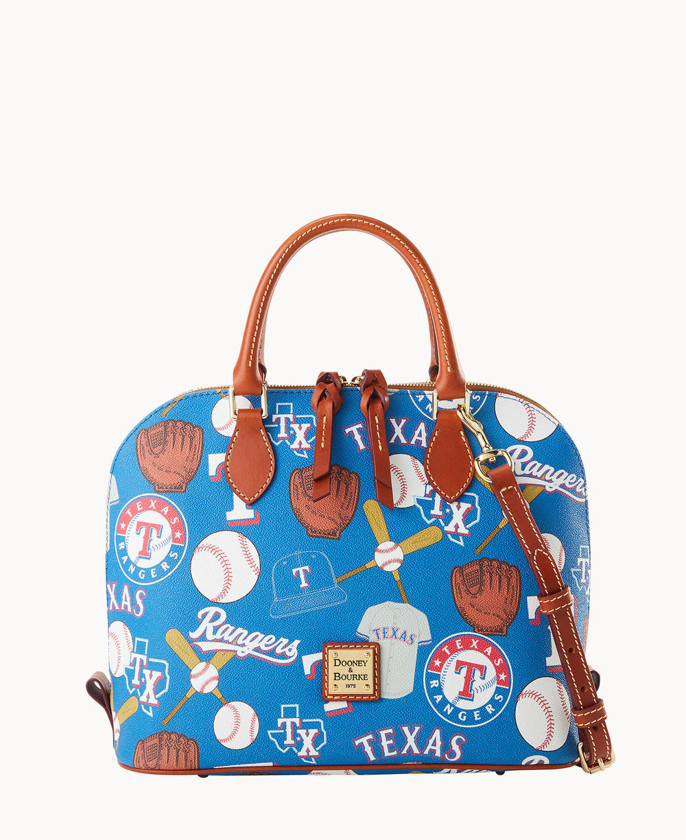 A blue Dooney & Bourke handbag featuring Texas Rangers logos, baseballs, bats, gloves, and the word Rangers, with brown leather handles and strap.
