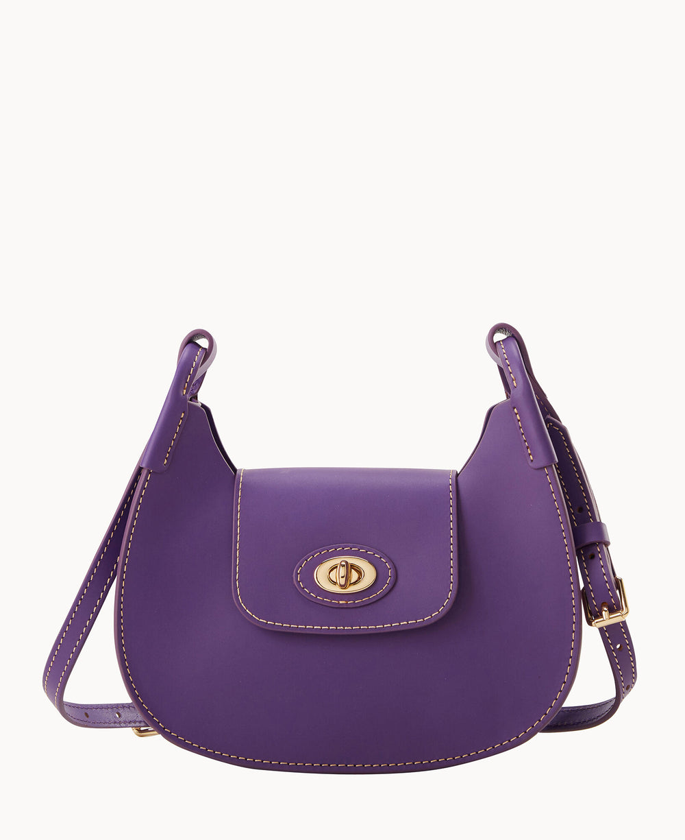 A purple leather shoulder bag with a curved flap, gold turn-lock closure, and adjustable strap. The bag features light-colored stitching along the edges and a smooth matte finish.