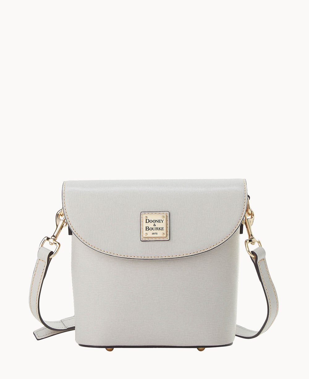 A light gray Dooney & Bourke crossbody bag with a flap closure, gold hardware, and an adjustable strap, displayed on a plain white background.