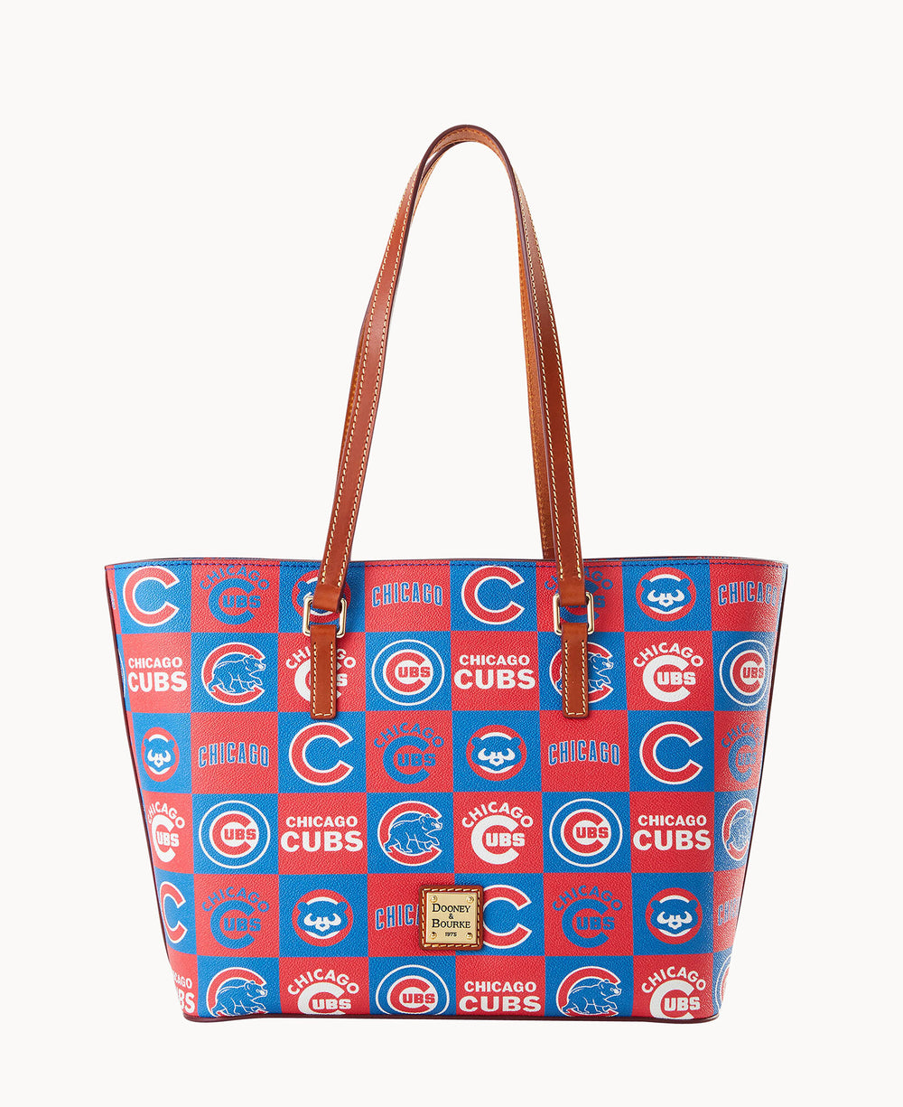 A blue and red tote bag with brown leather handles, featuring a checkerboard pattern of Chicago Cubs logos and text.