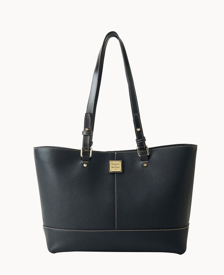 A black leather tote bag with double shoulder straps, gold-tone hardware, and a small rectangular gold logo plate on the front. The bag has subtle stitching details and a structured, spacious design.
