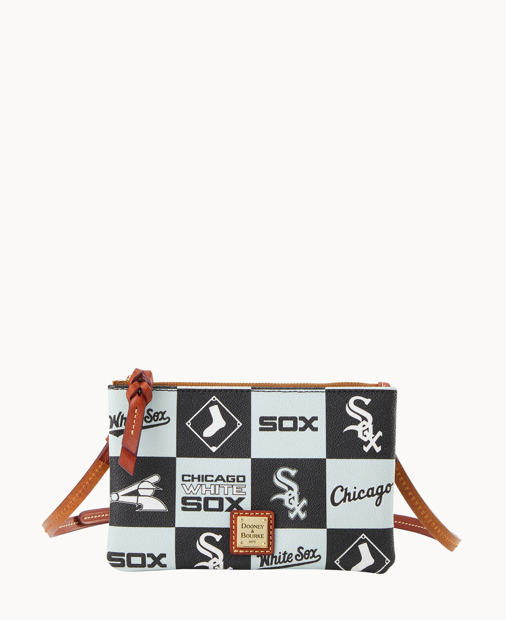 A small crossbody bag with a brown strap, featuring a black and white checkerboard pattern and various Chicago White Sox logos and text. The bag has a front leather Dooney & Bourke label and a zipper with a leather pull.