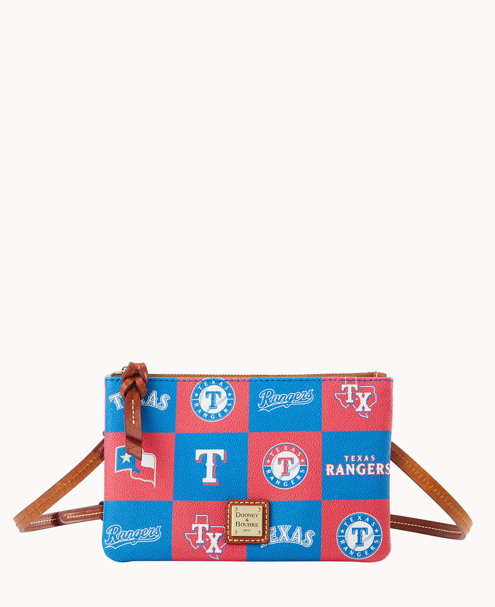 A rectangular crossbody bag with a brown strap, featuring a red and blue checkered pattern with Texas Rangers logos and a small leather bow accent on the zipper.