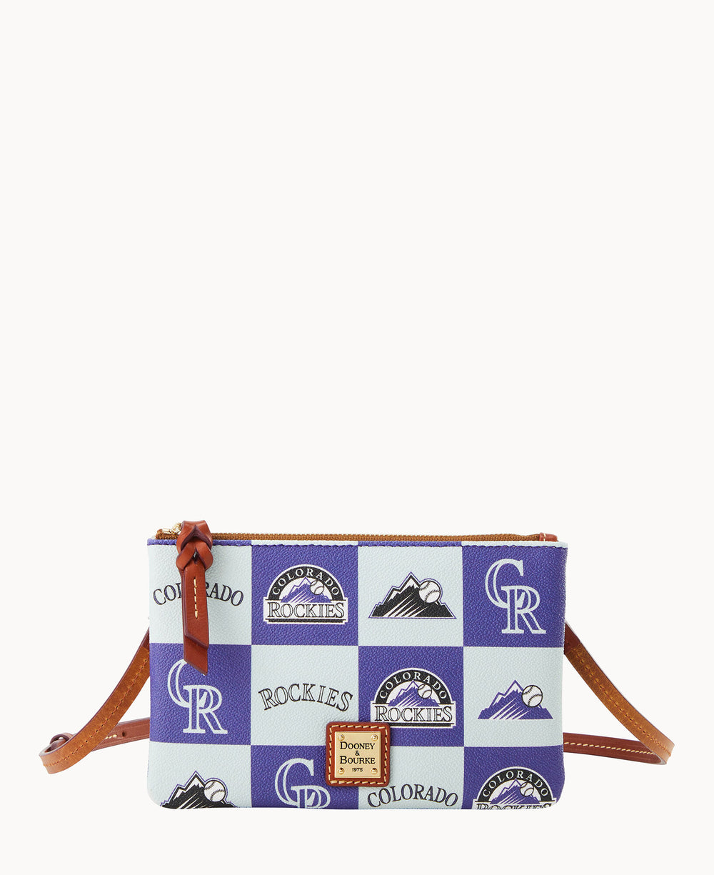 A small crossbody bag featuring a blue and white checkered pattern with Colorado Rockies logos, mountains, and Rockies text, plus brown leather strap and zipper pull.