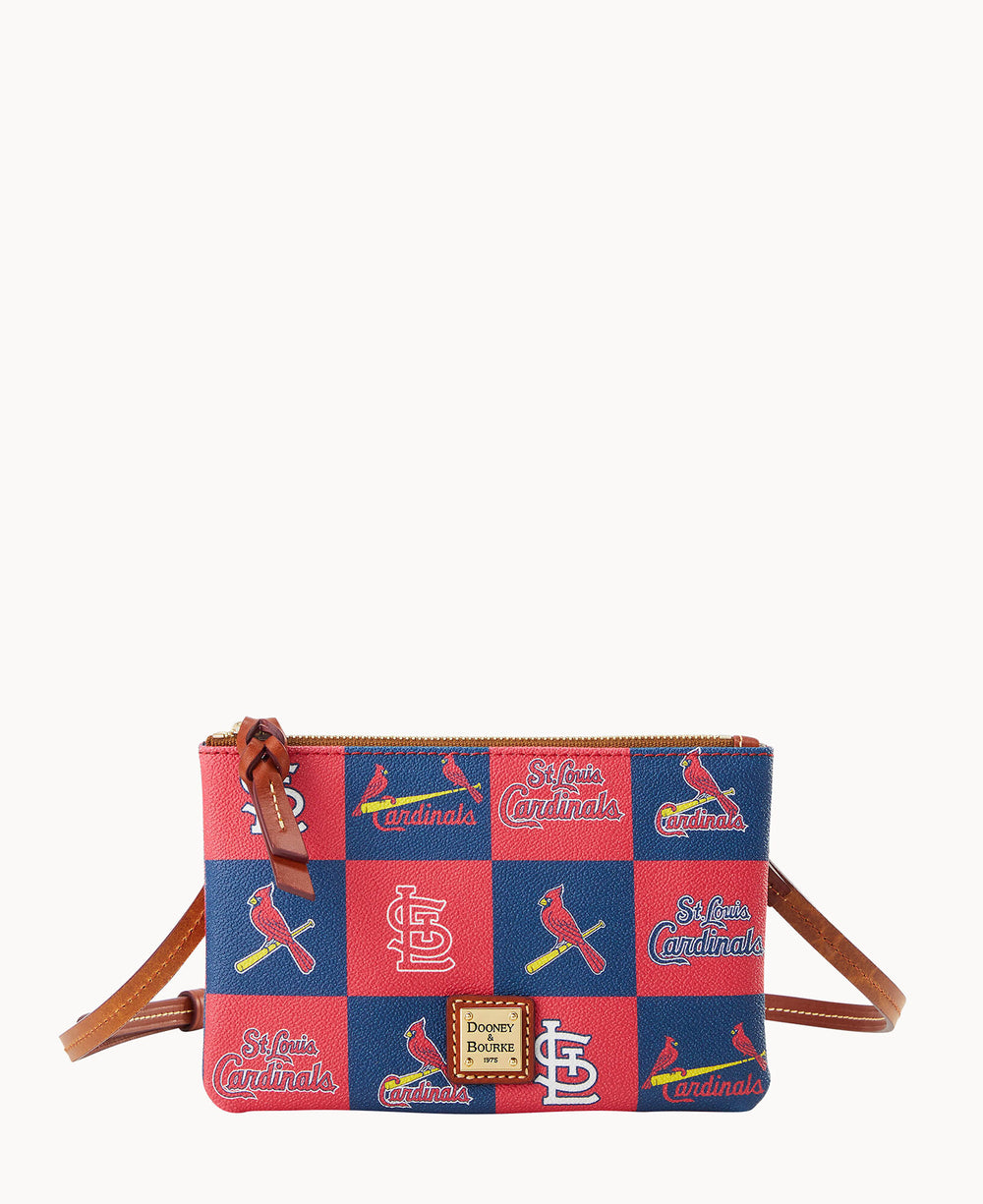 A red and blue checkered crossbody bag featuring St. Louis Cardinals logos and text, with a brown strap, gold zipper, and a small gold Dooney & Bourke label on the front.