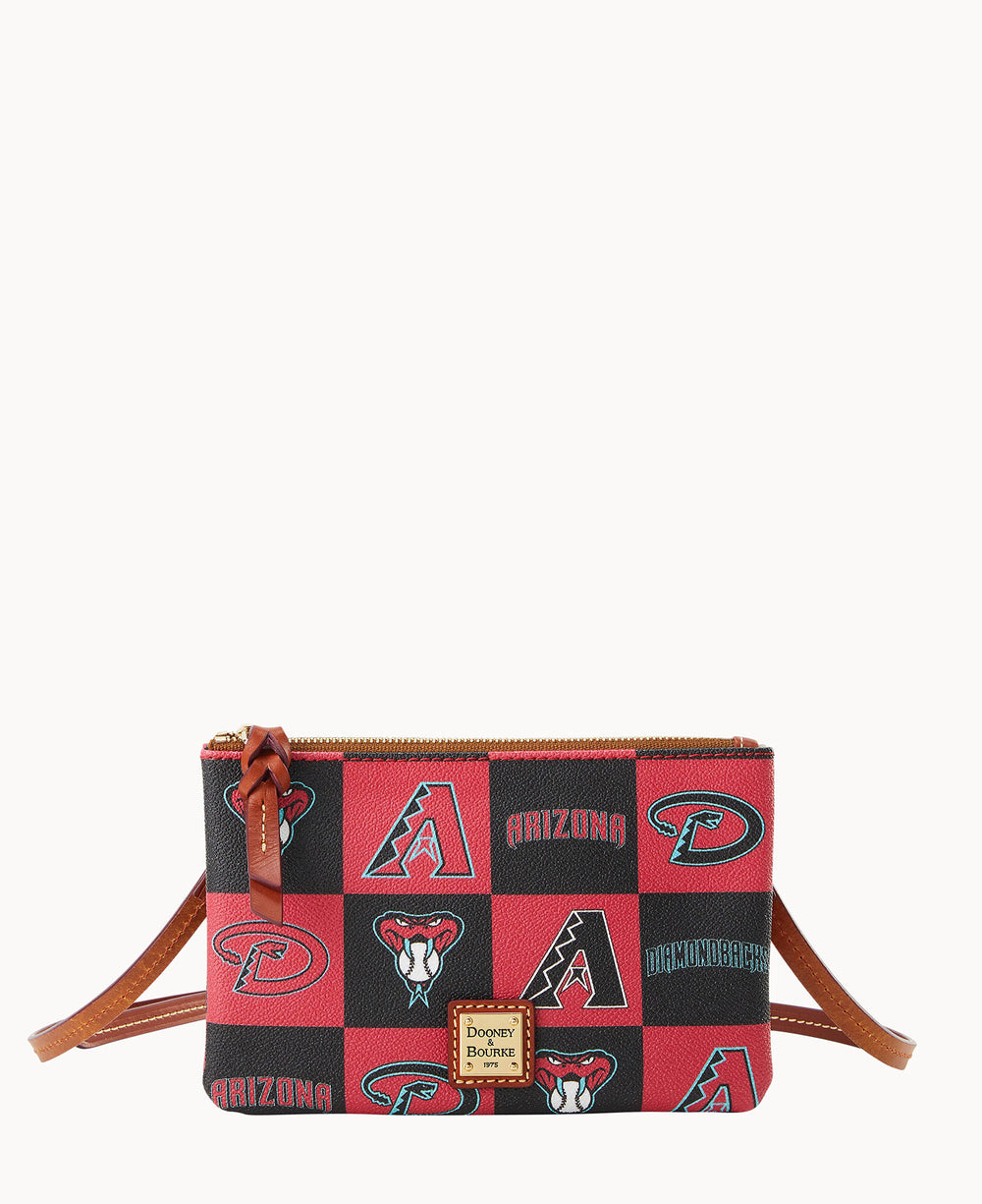 A small crossbody bag with brown leather straps features a red and black checkerboard pattern, Arizona Diamondbacks logos, and a Dooney & Bourke label on the front.