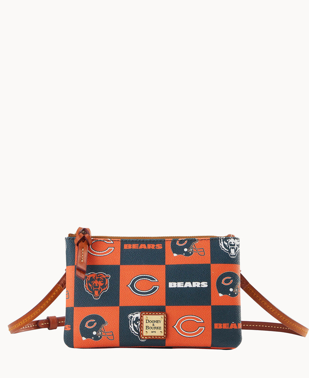 A small crossbody bag with a Chicago Bears design, featuring alternating orange and navy blue squares with team logos, Bears text, and an adjustable brown leather strap.