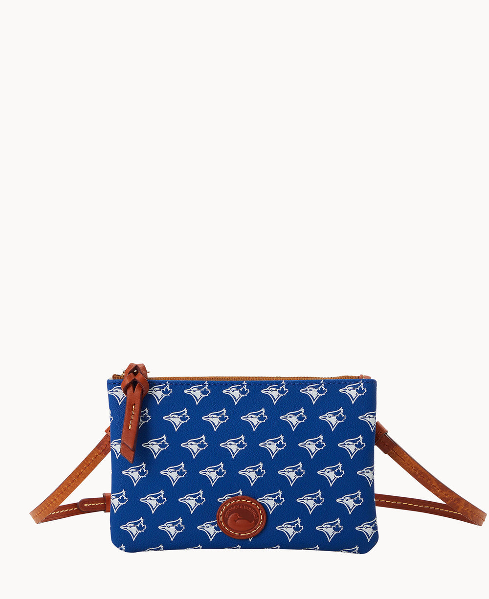 A small blue crossbody bag with a brown strap and zipper, featuring a repeating pattern of white bird logos and a round brown leather patch on the front.
