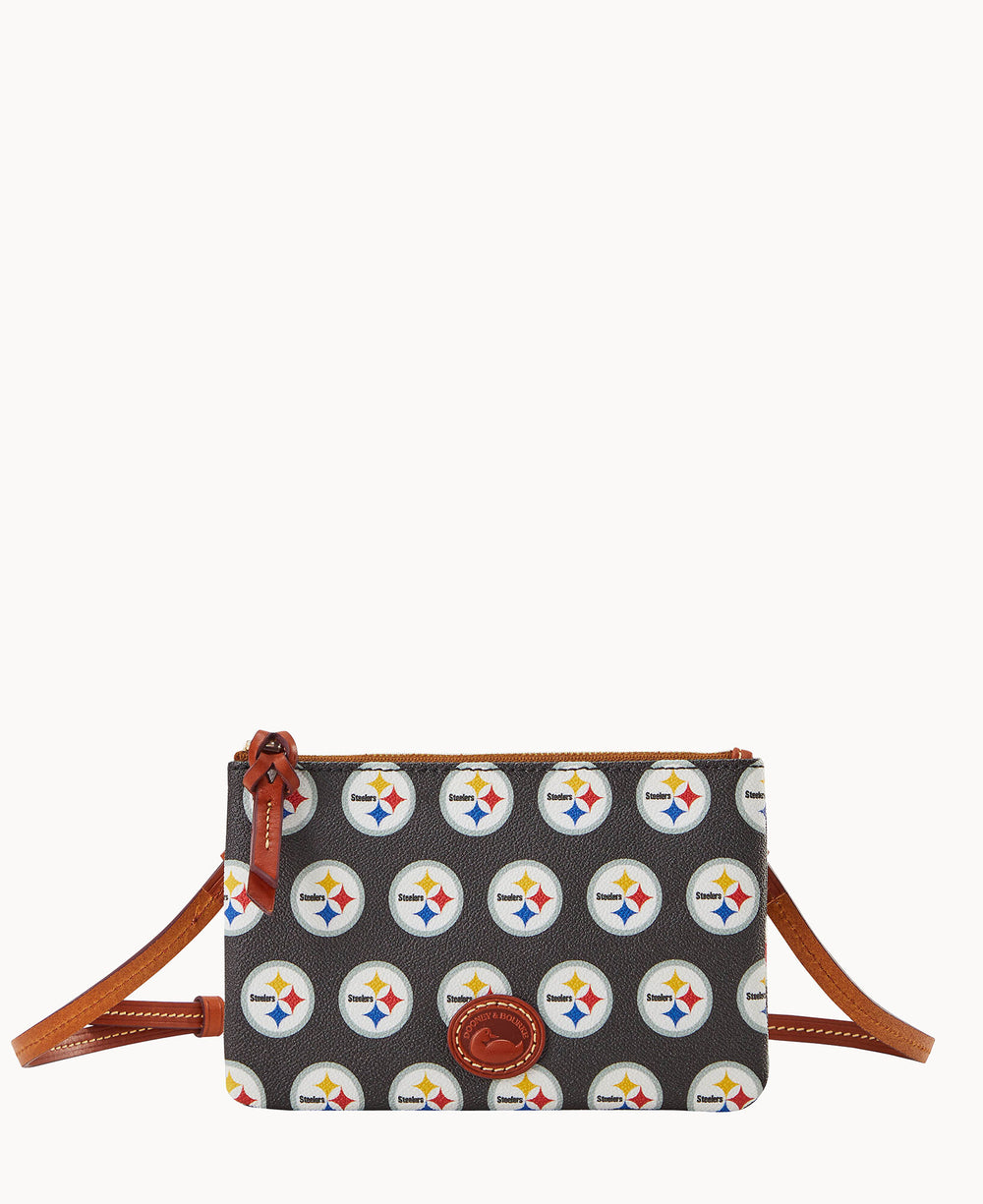 Small crossbody bag with brown leather trim and strap, featuring a repeating pattern of the Pittsburgh Steelers logo on a dark background.