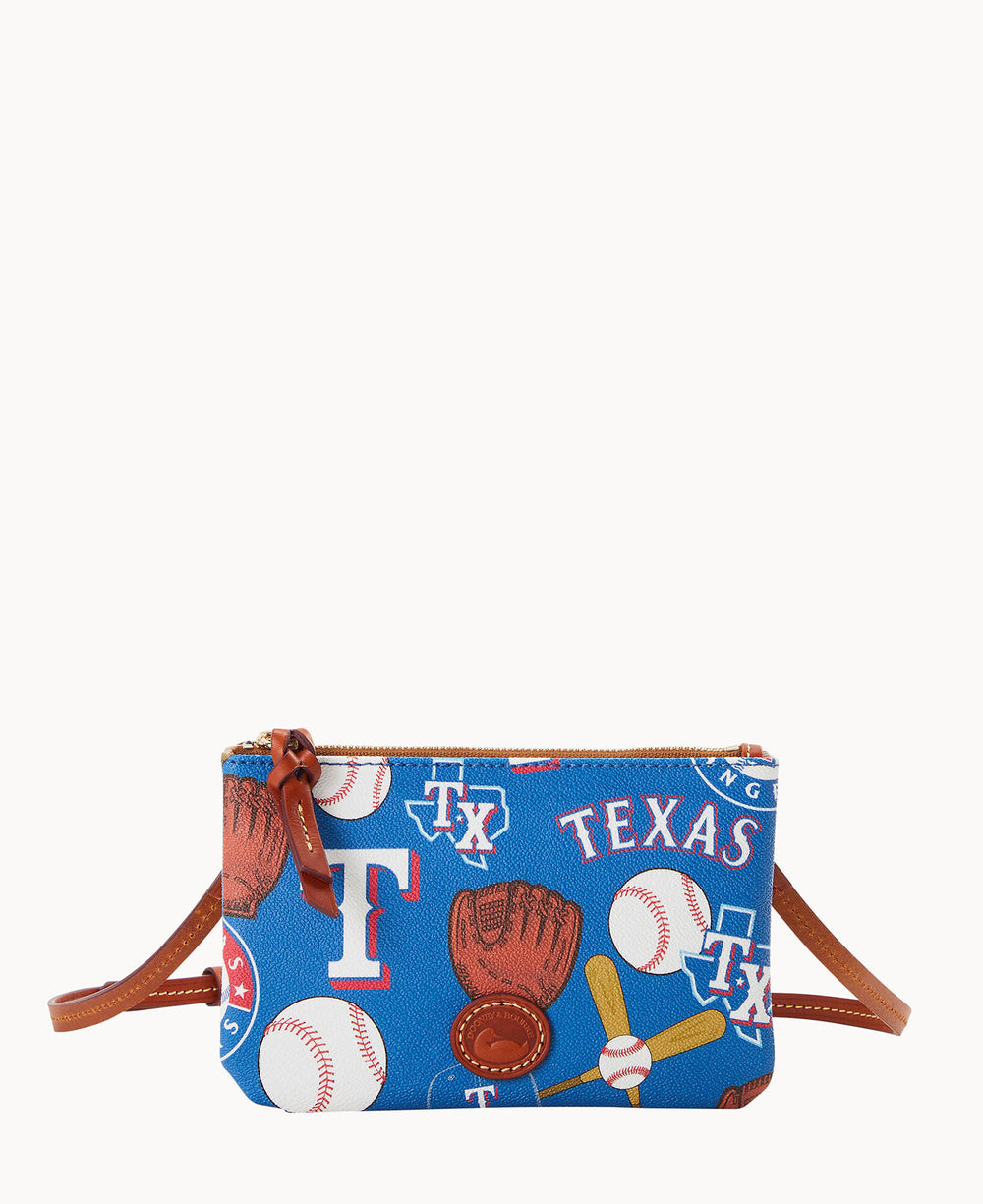A small blue crossbody bag with brown leather straps, decorated with Texas Rangers logos, baseballs, gloves, and bats in a playful, colorful pattern.