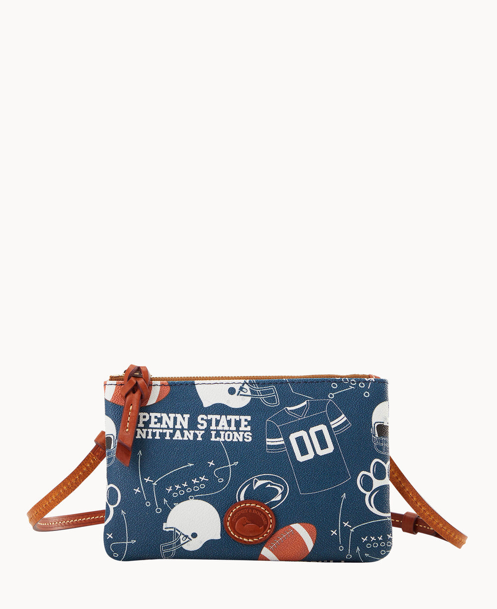 A blue crossbody bag with brown leather straps and accents, decorated with Penn State Nittany Lions football-themed graphics, including helmets, jerseys, play diagrams, and the team name in white.