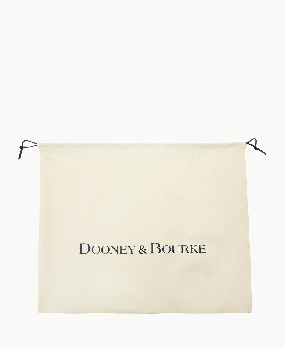 A cream-colored drawstring dust bag with the text DOONEY & BOURKE printed in dark letters on the front. The drawstrings are black and positioned on each side of the bag.