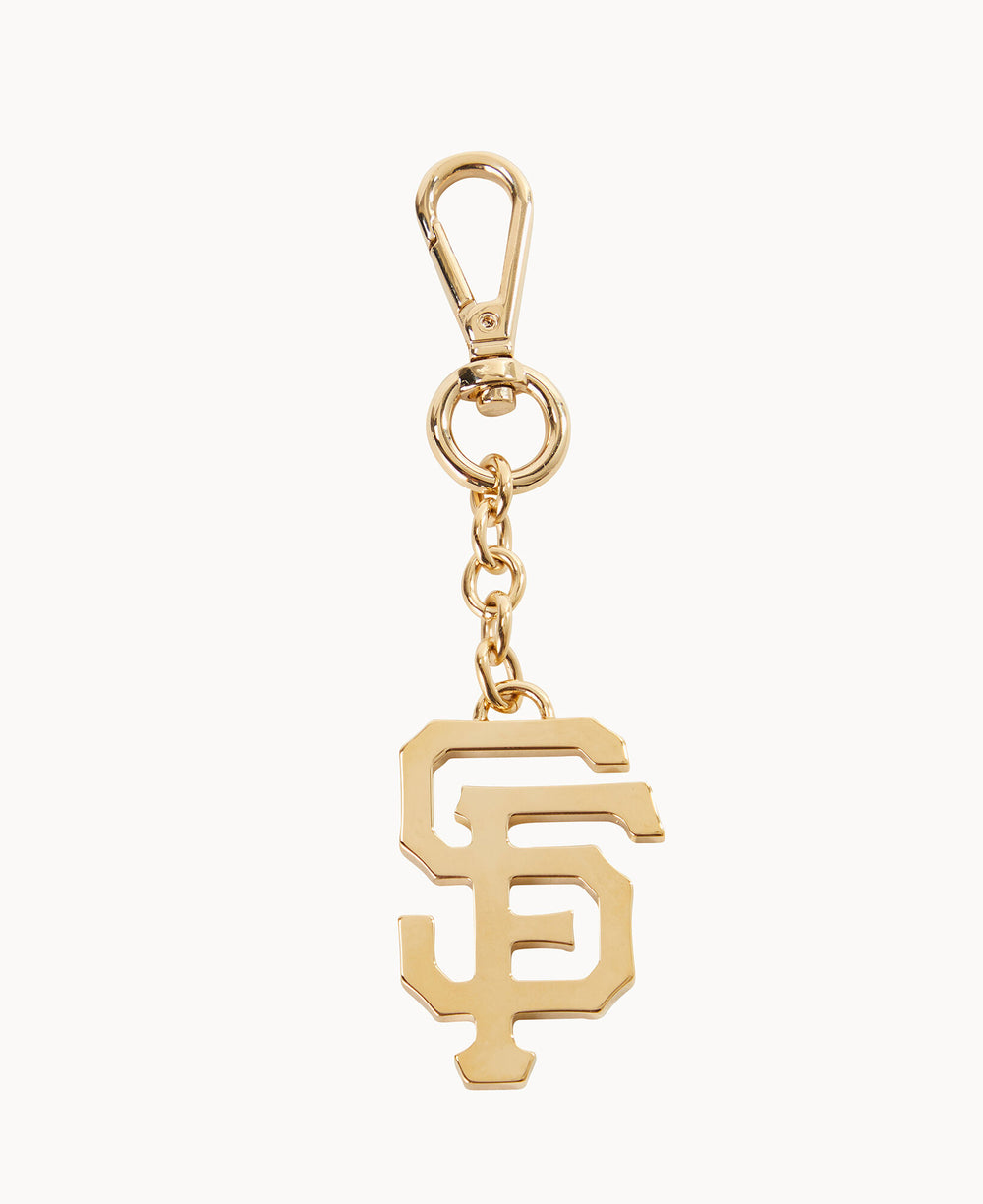 Gold keychain with a lobster clasp and a dangling charm shaped like the interlocking letters SF in a bold, stylized font, against a plain white background.