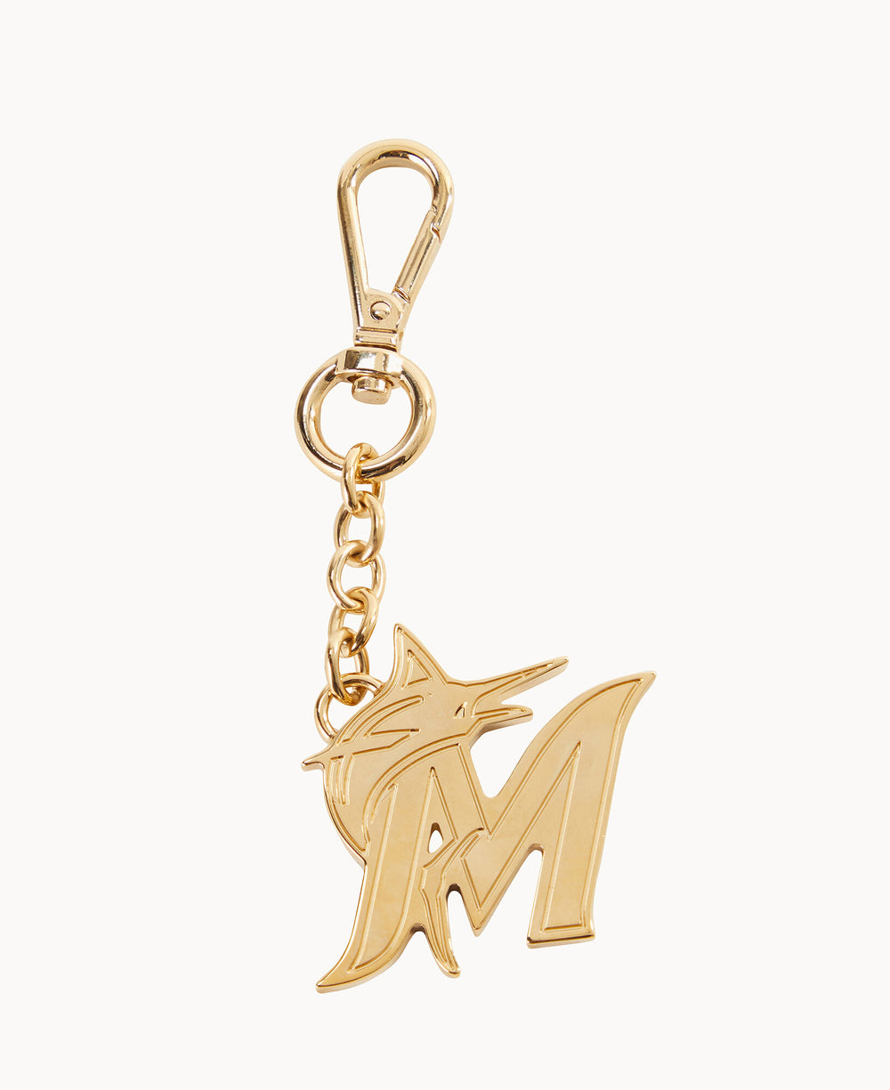 A gold keychain featuring the Miami Marlins logo with a stylized fish and an â€œM,â€ attached to a chain and clasp.