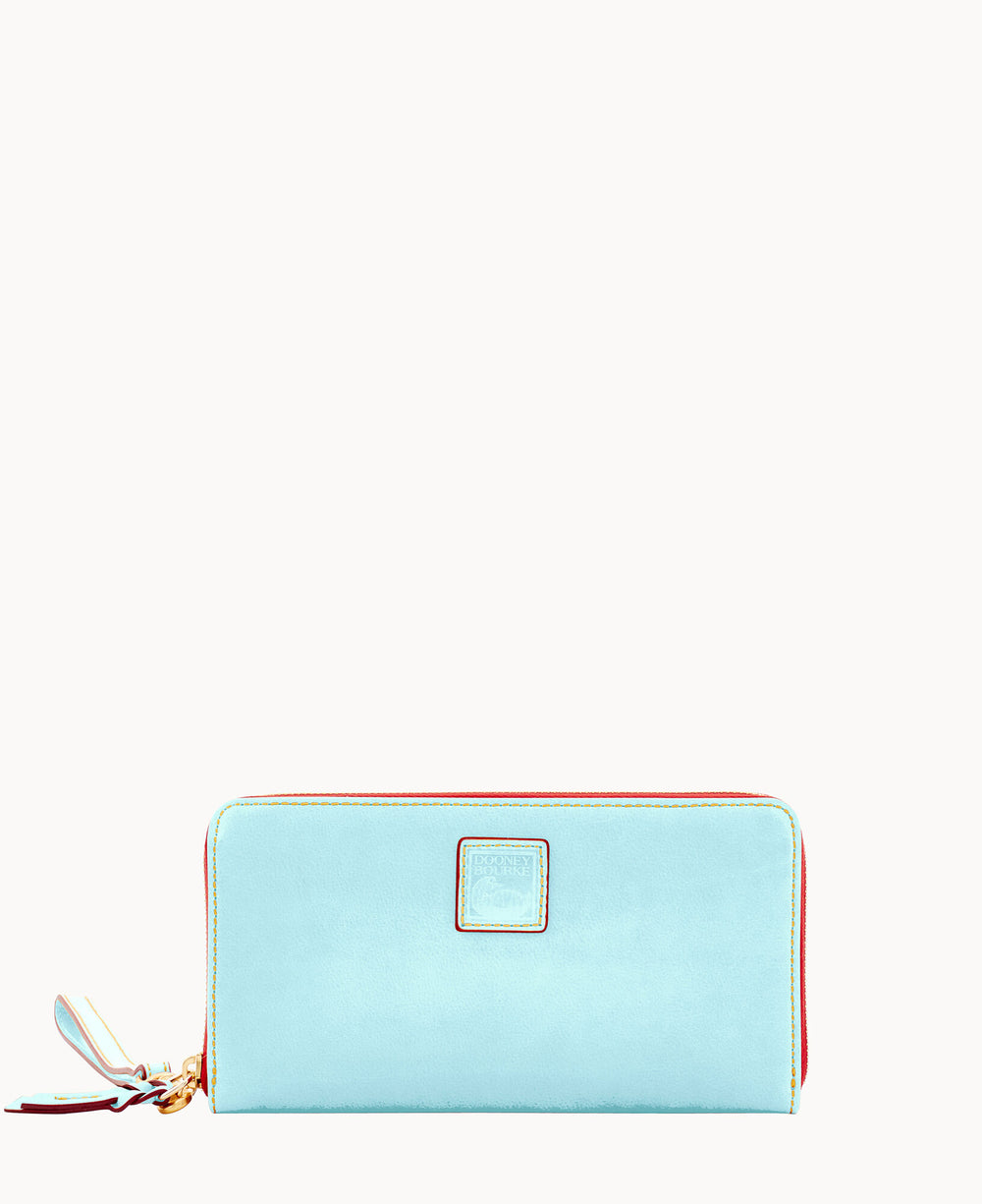 A light blue rectangular zippered wallet with a gold zipper, red trim, and a small square logo on the front. Attached to the zipper is a leather tassel. The background is white.