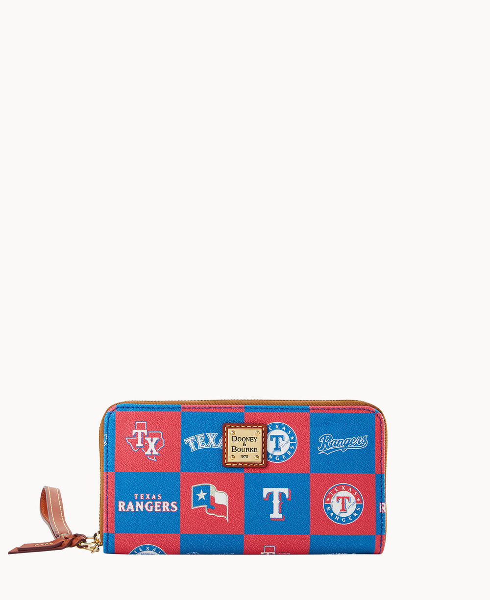 A rectangular zippered wallet with a blue and red checkered pattern featuring various Texas Rangers baseball team logos and a tan leather zipper pull.