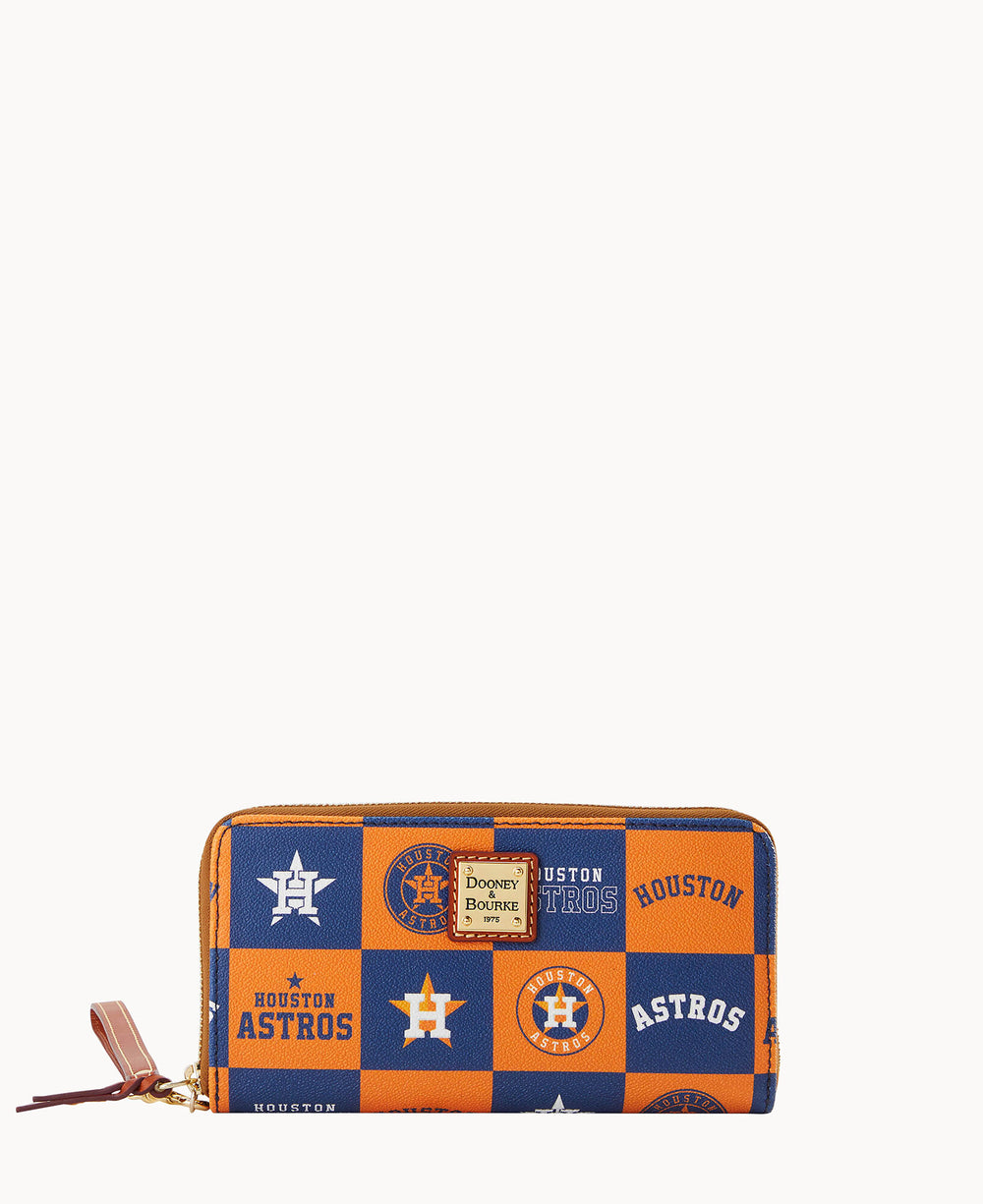 A zippered wallet with a blue and orange checkered pattern featuring various Houston Astros logos and the Dooney & Bourke label on the front.