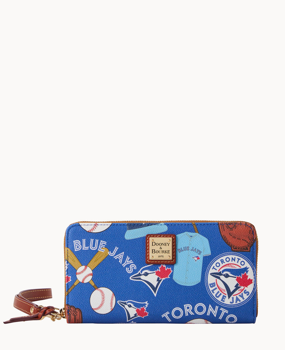 A blue zippered wallet with Toronto Blue Jays logos, baseball equipment illustrations, and a brown leather wrist strap. The wallet features a Dooney & Bourke logo patch on the front.