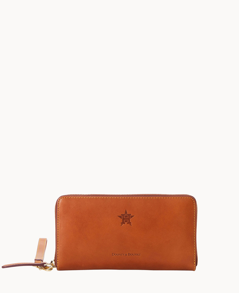 A tan leather zippered wallet with a wrist strap, featuring an embossed logo and the text Dooney & Bourke on the front, displayed against a plain white background.