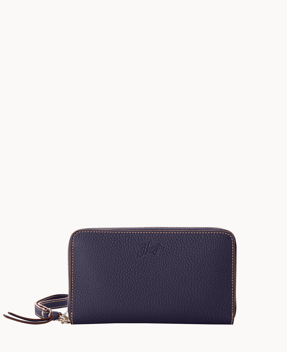 A navy blue leather zip-around wallet with a wrist strap, featuring textured material and subtle stitching along the edges, set against a plain white background.