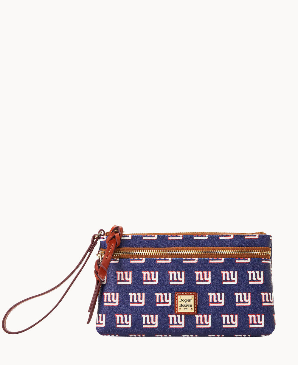 A blue wristlet pouch with brown leather accents, featuring a repeating white and red ny logo and a gold Dooney & Bourke label on the front.