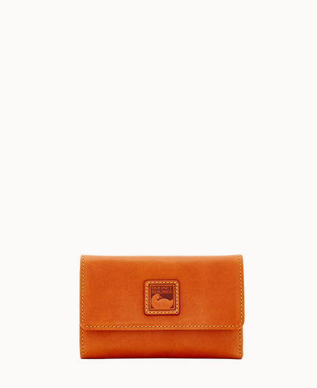 A small, rectangular, tan leather wallet with a stitched border and an embossed logo patch centered on the front flap, displayed against a plain white background.