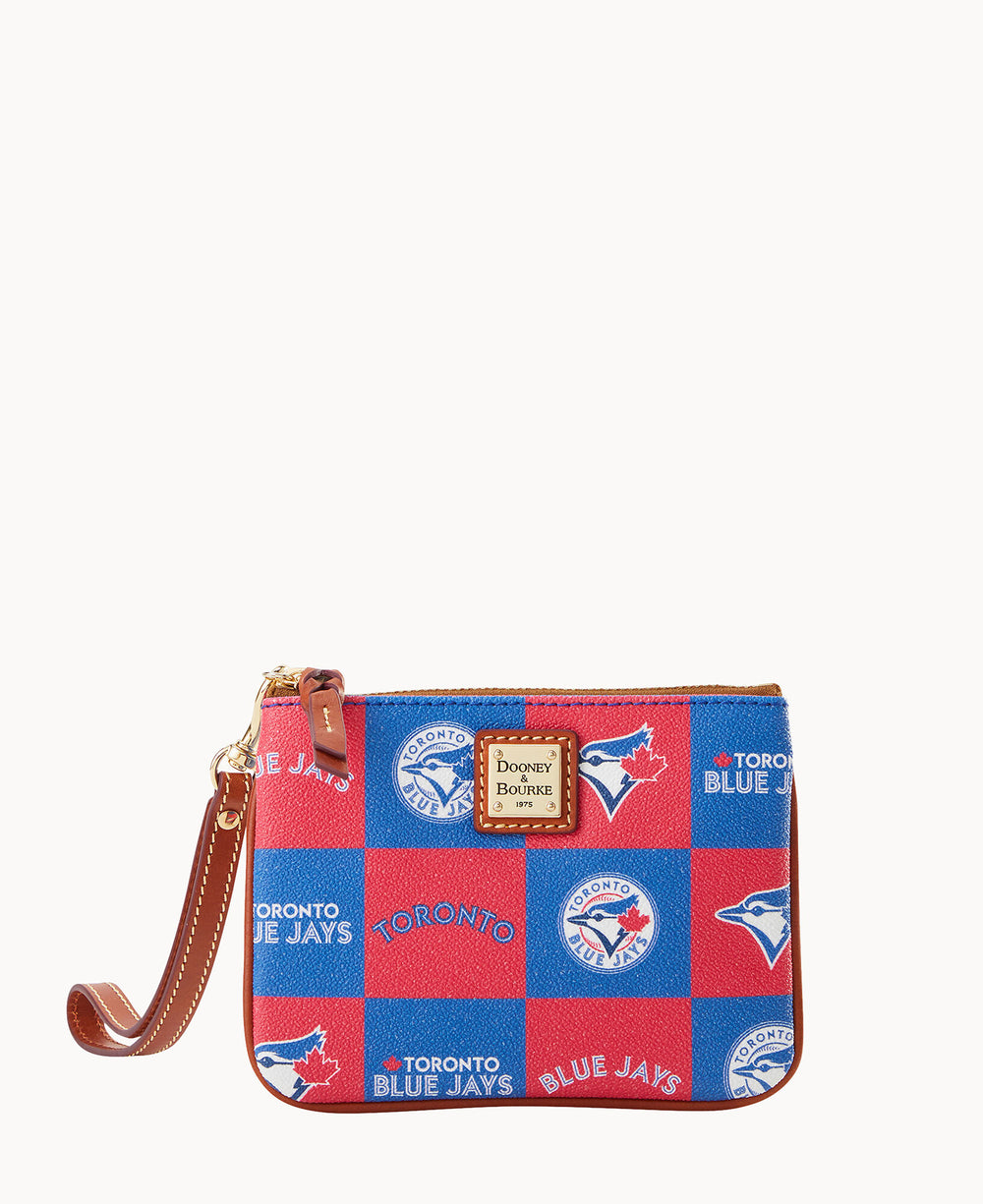A red and blue wristlet pouch with a brown leather strap, featuring Toronto Blue Jays logos and text in a checkered pattern, and a Dooney & Bourke logo patch on the front.