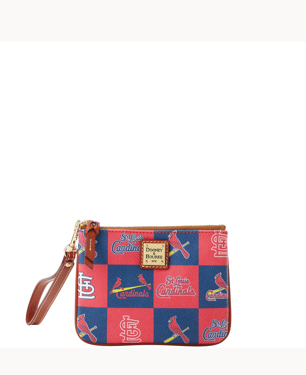 A small wristlet pouch with a red and blue checkered pattern featuring St. Louis Cardinals logos and text, a gold zipper, brown leather strap, and a Dooney & Bourke logo plate on the front.