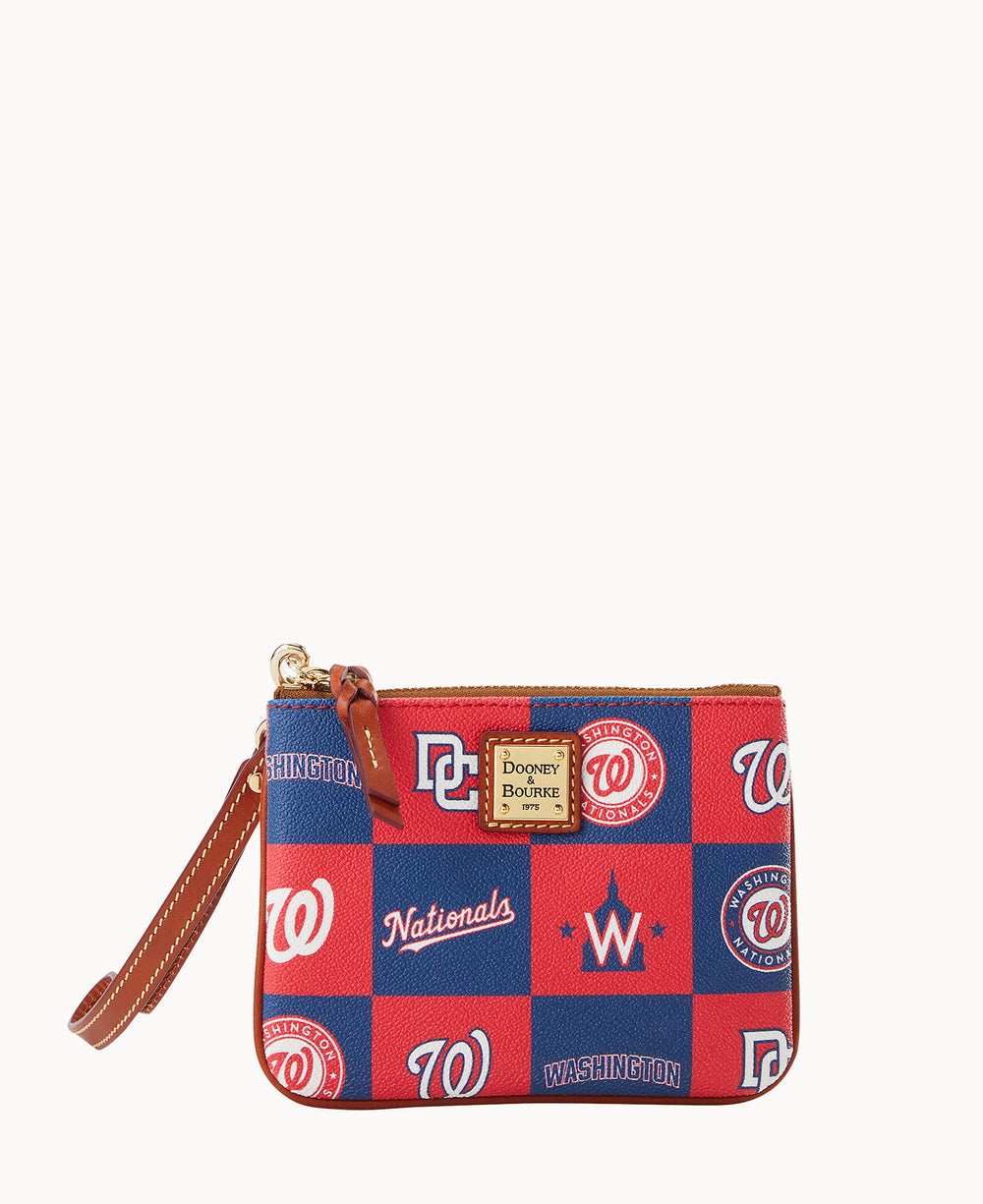 A small wristlet pouch with a leather strap, featuring a red and blue checkered pattern with Washington Nationals baseball team logos and a gold Dooney & Bourke label on the front.
