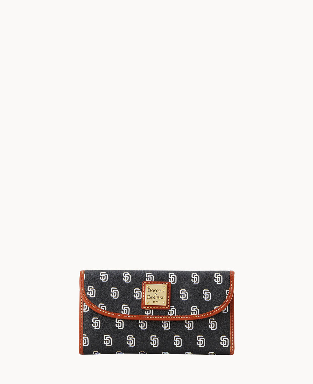 A black wallet with a repeating white SD pattern, brown leather trim, and a Dooney & Bourke logo patch on the front.
