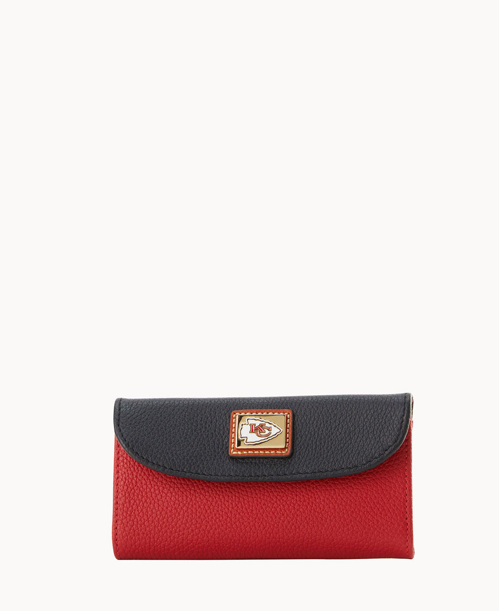 A small wallet with a black flap and red body, featuring the Kansas City Chiefs logo on a rectangular patch in the center of the flap.